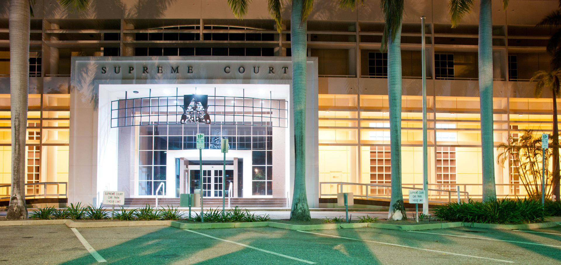 Front of the Supreme Court at night.